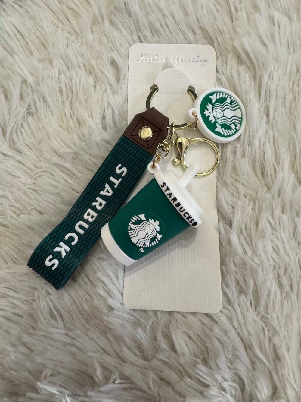 Starbucks green & white cup keychain with white Starbucks logo strap